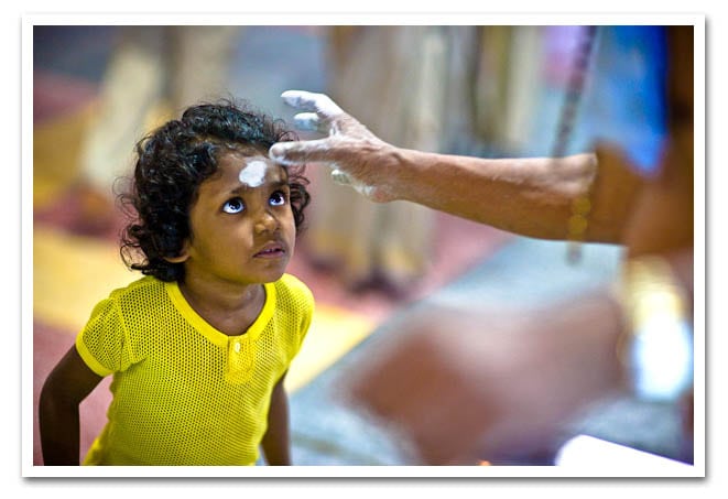 A Child Devotee revies her tika at the Muruga Temple. A Child Devotee revies her tika at the Muruga Temple.