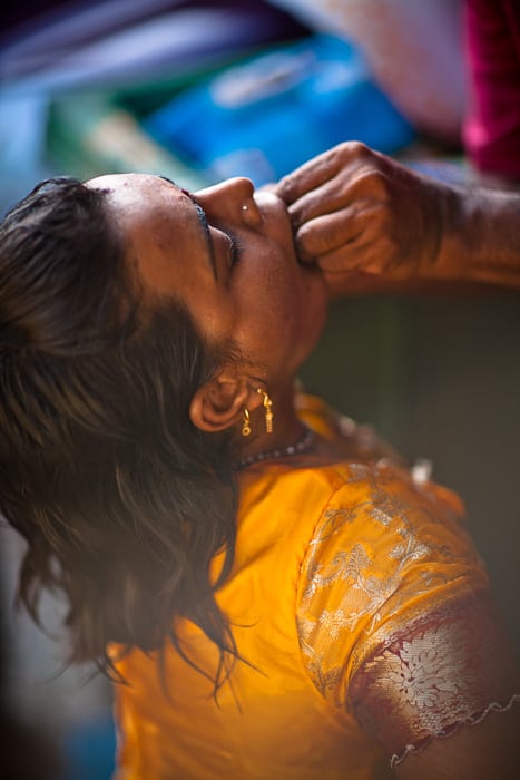 After the spirit takes control they push the "vel" or needles through her cheeks.