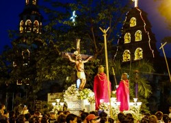 A statue of the crucifixion pulled in from of the Basilica.